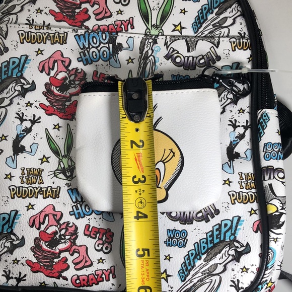 Looney Tunes All Over Print Faux Leather 10.5" Women’s White Mini Backpack. - Picture 13 of 15